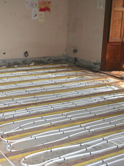 Underfloor heating to a timber suspended floor in a Grade II listed property