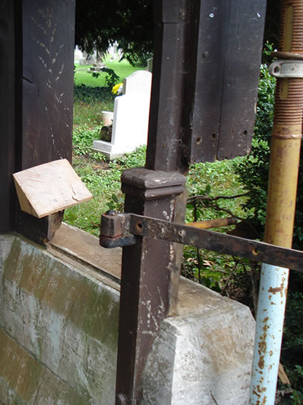 Before repairs to rotten Grade II listed lych gate